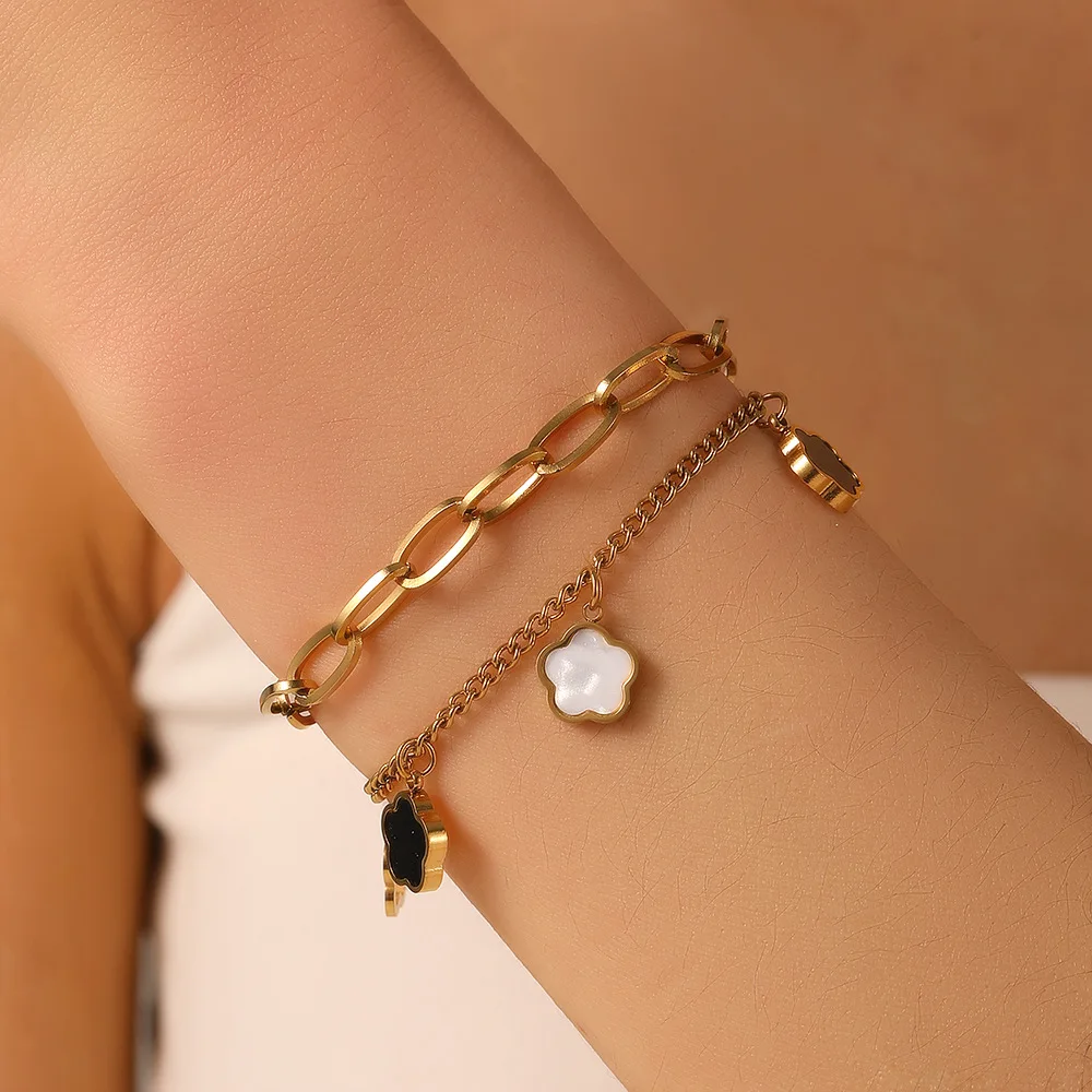 

Stainless steel black shell flower bracelet for women, titanium steel, colorfast, double-layer hollowed-out five-petal flower.