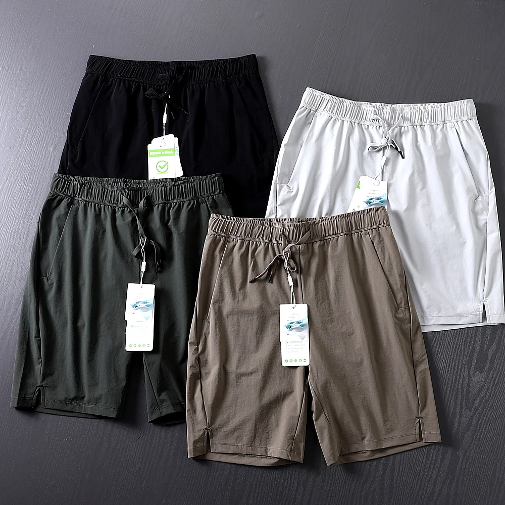 

Модные летние спортивные шорты для активного отдыха: быстросохнущие, дышащие, приятные к коже, из хлопка, простого кроя, для фитнеса, длиной до колена.