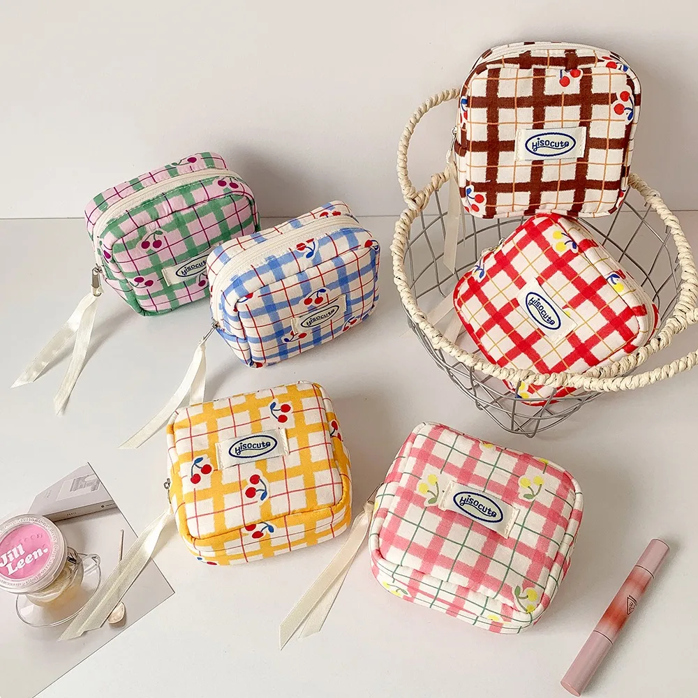 Korean version of large plaid cosmetic bag high value small cherry sanitary napkin portable mini storage bag bluetooth headset b