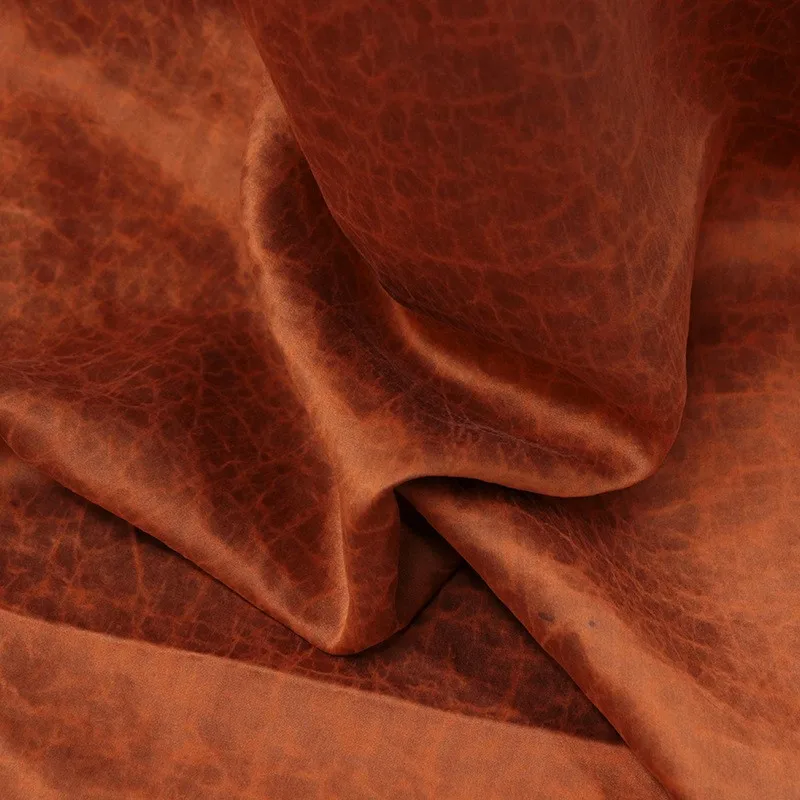 

Caramel-colored plain satin with crack pattern traditional Xiangyunsha fabric designer's