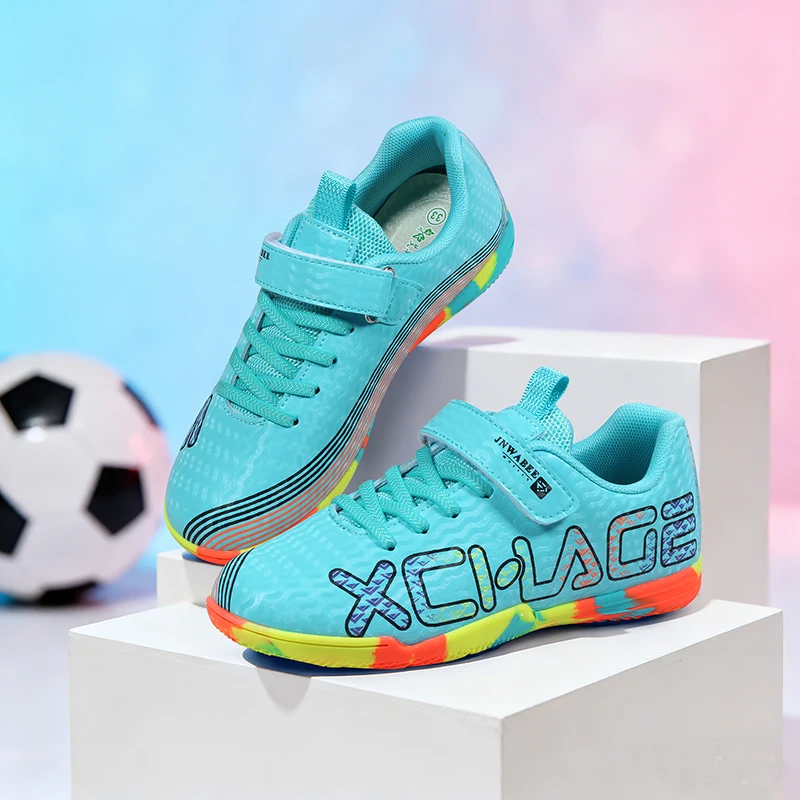

A pair of children's perforated mesh football shoes with magnetic fasteners, anti-slip rubber sole for training,HXH-88001