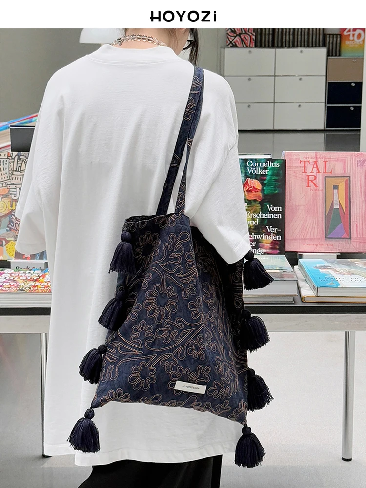 

Blue Island gilt tassel literary shoulder bag