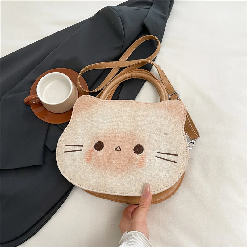 

Однотонные сумки из искусственной кожи в форме кошки с верхней ручкой, студенческие милые модные сумки, женские сумки 2025, горячая распродажа, нишевые дизайнерские женские сумки