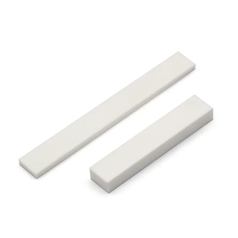 100 قطعة عالية الجودة لتقوم بها بنفسك فارغة الجاموس العظام الغيتار الجوز السرج للكهرباء باس الصوتية الكلاسيكية الغيتار مندولين البانجو القيثارة