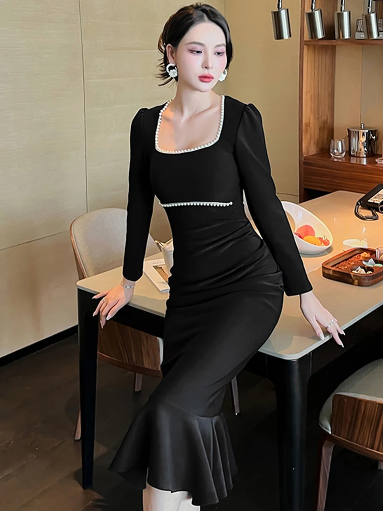 slim fit dress slacks Madeleine | Black Fishtail Maxi Dress with Bardot Mesh Long Sleeves main image 0