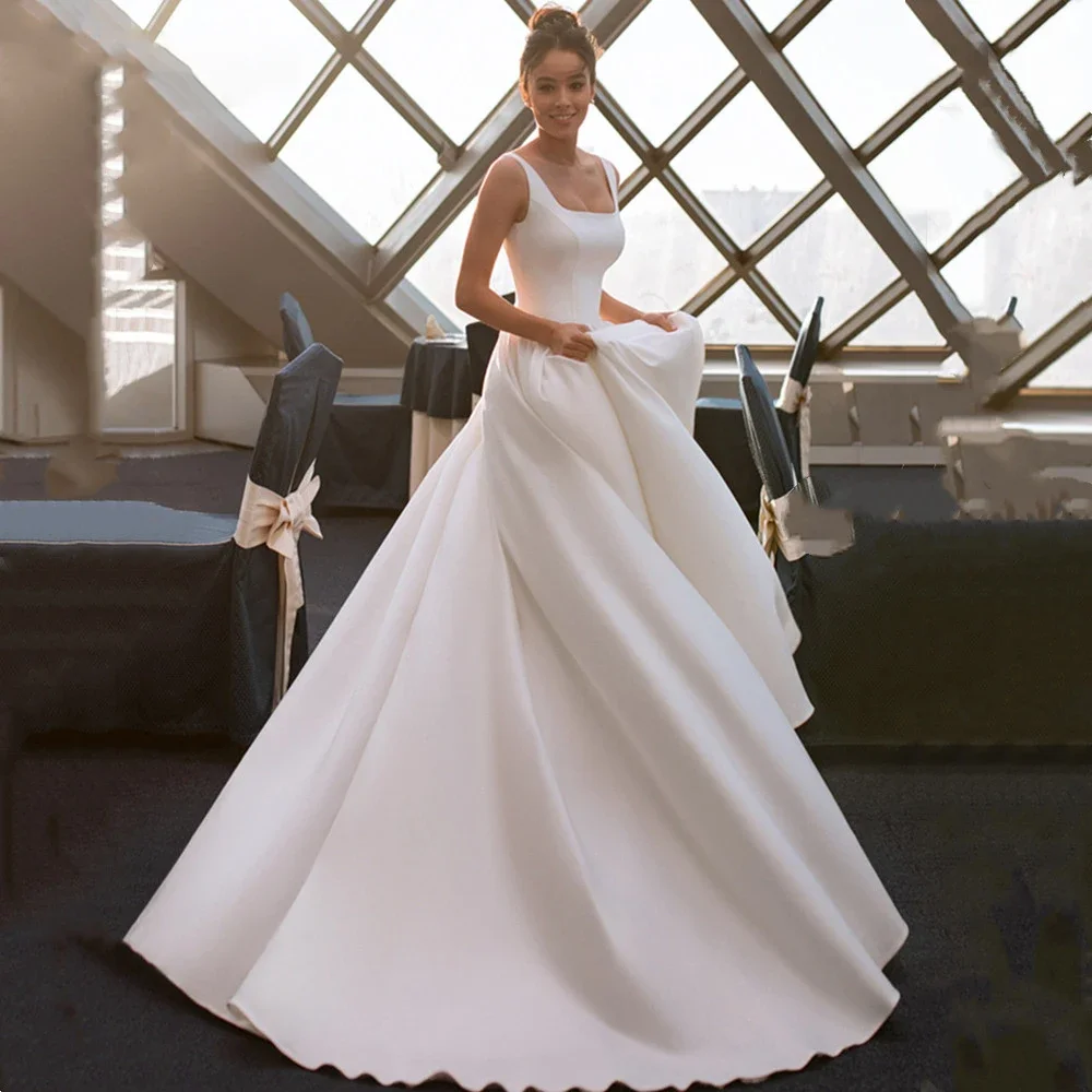 

A-Line Satin Princess Wedding Dresses For Women Sleeveless Backless Boat Neck Long White Bridal Dress Robe De Soirée De Mariage