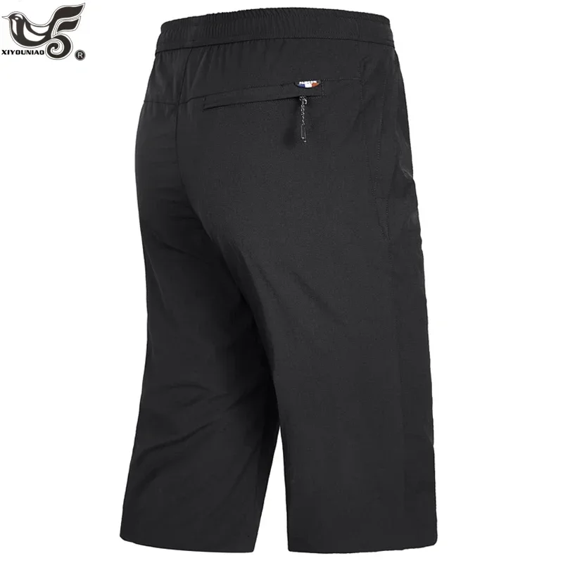 Plus Size 7XL 8XL Casual Quick Dry Capri Pants Cargo Shorts Men Summer Beach Joggers Running Camping Hiking Shorts Odzież męska