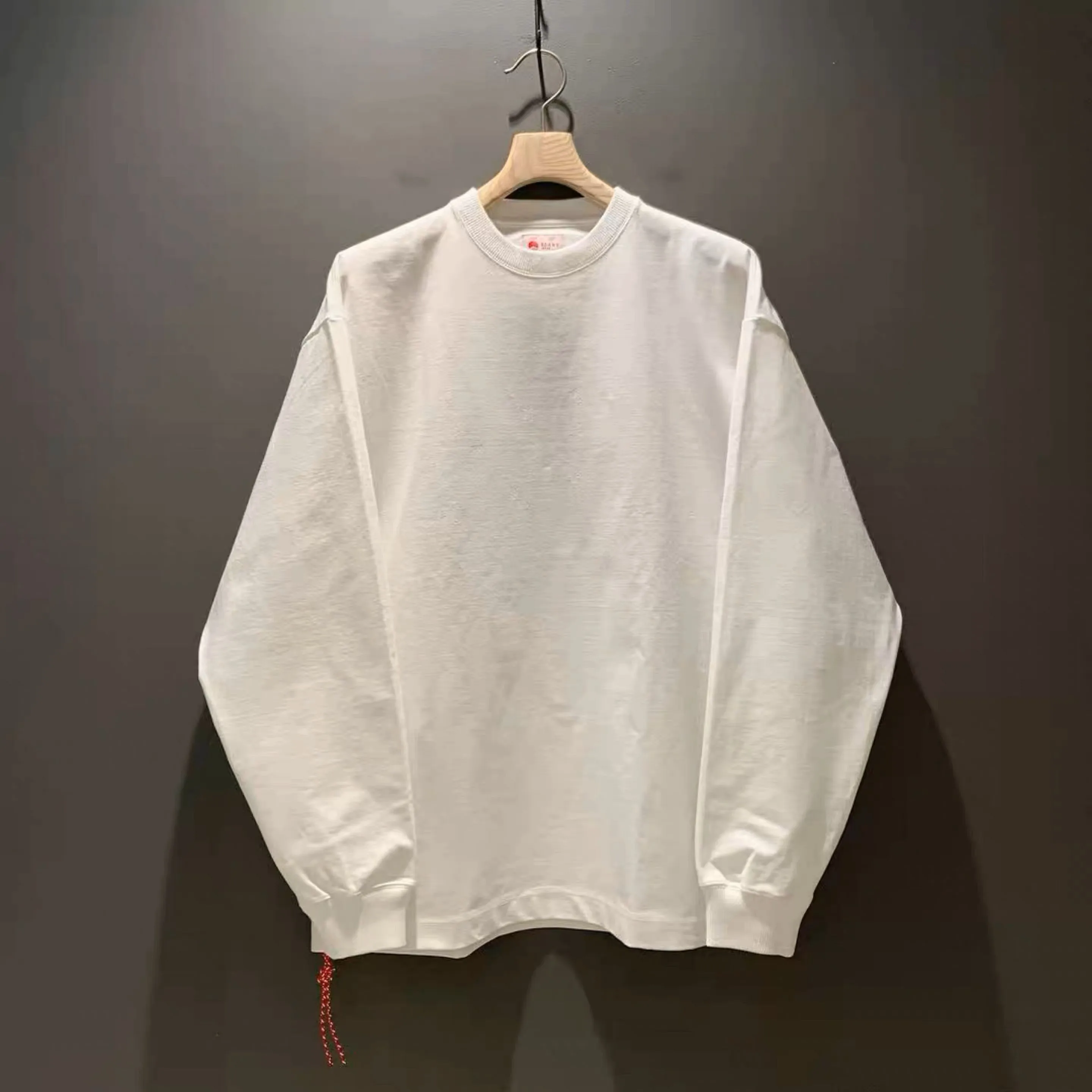 

Japan 23SS New Heavyweight Base Pure Cotton round Ne Loose Casual Red Rope Long Sve T-irt Youth Faion Autumn Collection