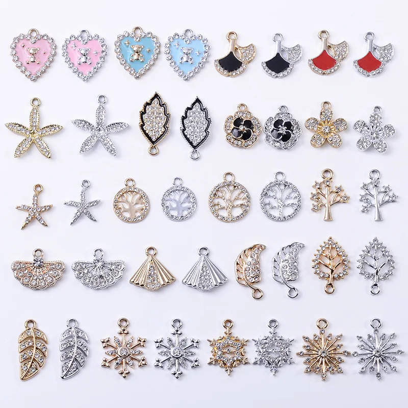 

UV color retention alloy material pendant snowflake leaves love bear DIY jewelry handmade materials spot wholesale