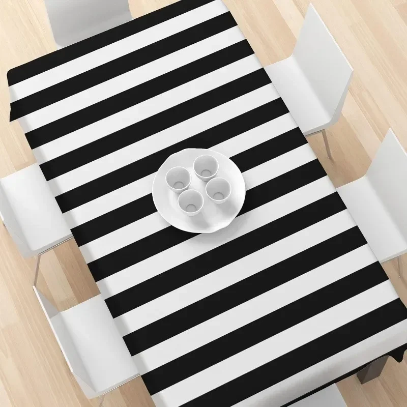 One fashionable striped tablecloth, adding modern touch to the dining table. Rectangular, durable polyester fabric.zyc