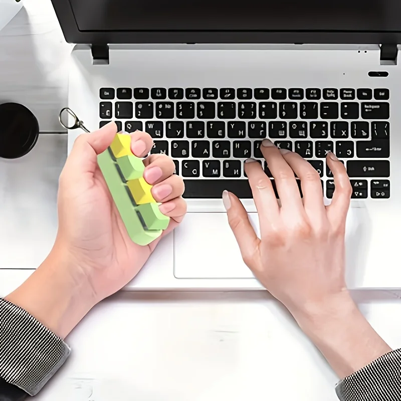 2 stress relief keychain fidget toys, keyboard key design, finger press toy, relieves stress and fatigue.