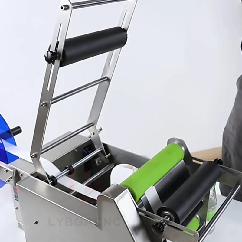 LY กึ่งอัตโนมัติรอบขวดเครื่องติดฉลากขวดแก้วมือถือ Labeler เหมาะสําหรับ 12-150 มม.ขวดเส้นผ่านศูนย์กลางภายนอก