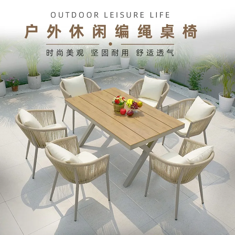 Outdoor leisure courtyard villa with waterproof tables and chairs outside, outdoor balcony garden table and chair combination.