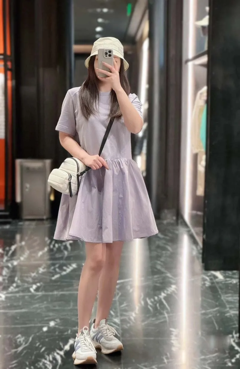 

College style women's dress fashion trend simple and versatile T-shirt splicing fake two A-line short skirts