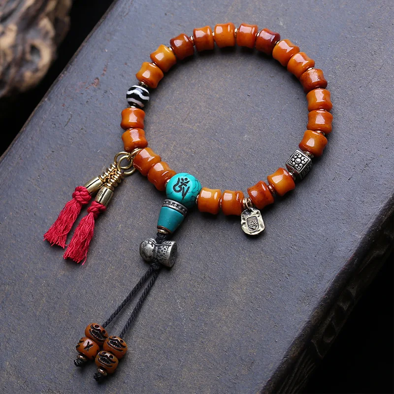 Yak bone bamboo joint bracelet, single strand, symbolizing upward growth, with deer antler, agate, dzi beads, sandalwood, and co