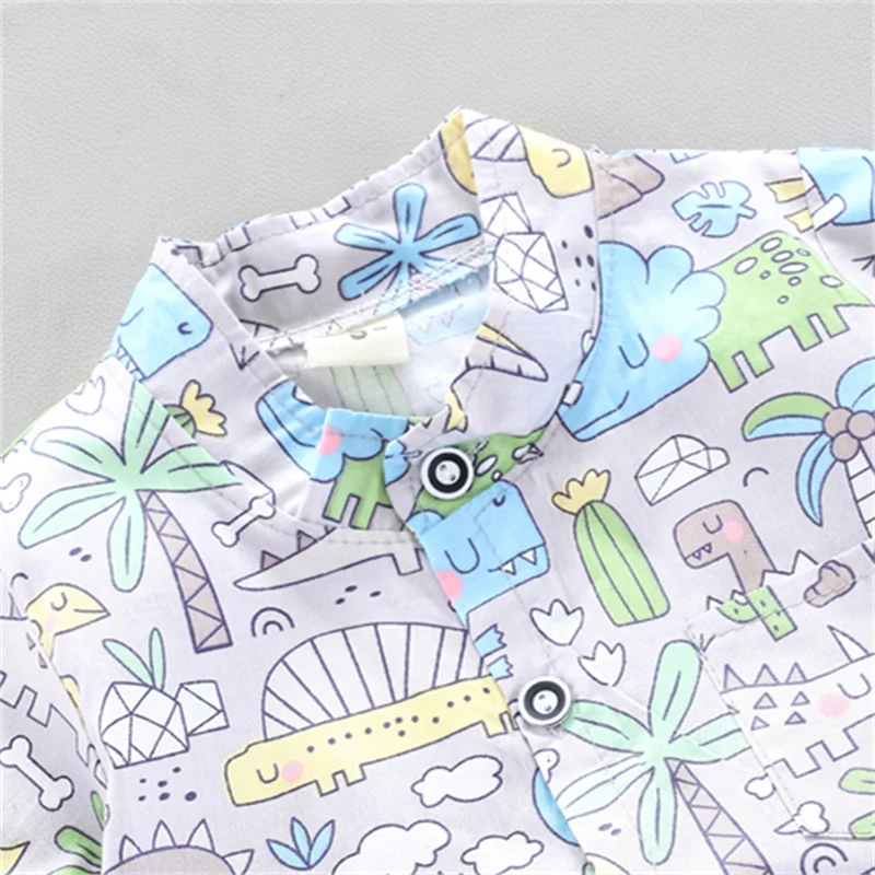 2PCS Infant and Toddler Summer Fashion Full Body Cartoon Dinosaur Coconut Tree Pattern Random Print Pocket Shirt Shorts Set