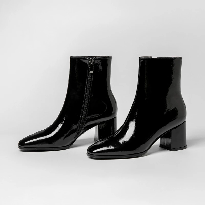 Winter French-style short boots with leather upper and thick heel. Made of genuine leather. Large size. Fashion boots for women.