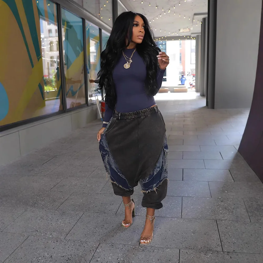 جينز حريم فضفاض بنمط صيفي جديد لعام 2025 للنساء الأوروبيات والأمريكيات. جينز عصري بخصر مطاطي وتصميم شرابة