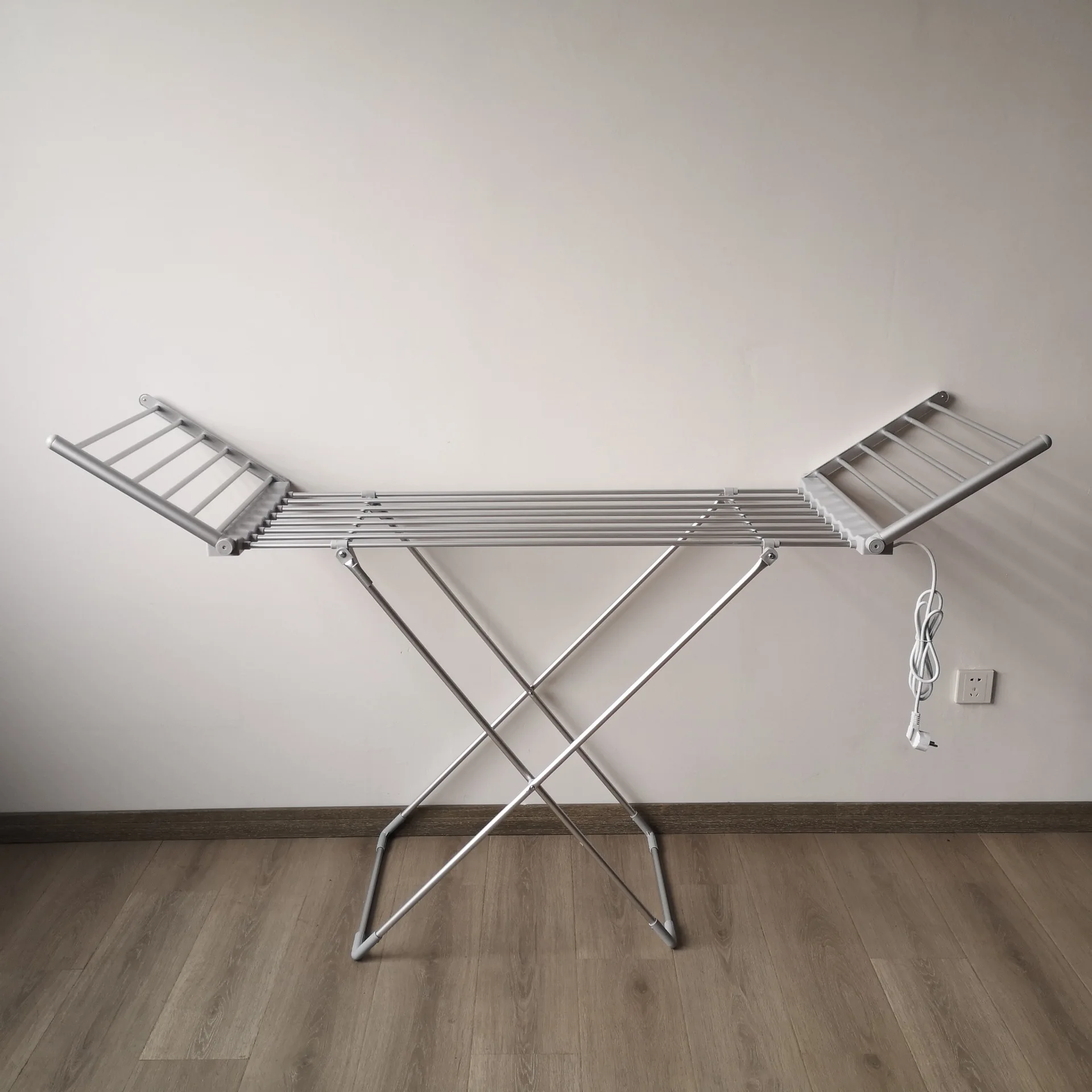 

Wing-shaped Electric Heating Foldable Metal Standing Type Constant Temperature Clothes Drying Rackpromote sales