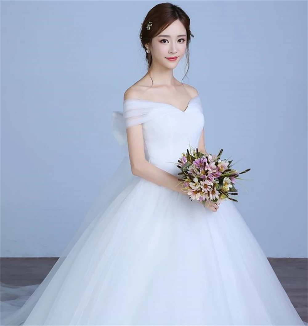 ZJ9130 Customized Lace Appliqued Bridal Gown For Women Illusion Beach Wedding Dress For Women 2026 Bride