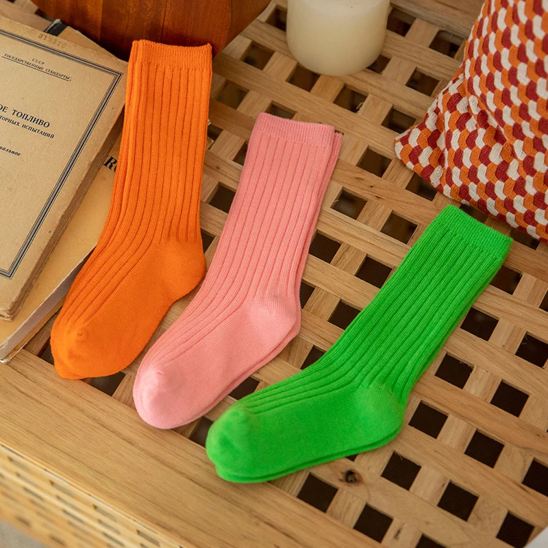 

Three pairs of girls' autumn and spring Korean-style versatile bright color long socks soft and comfortable