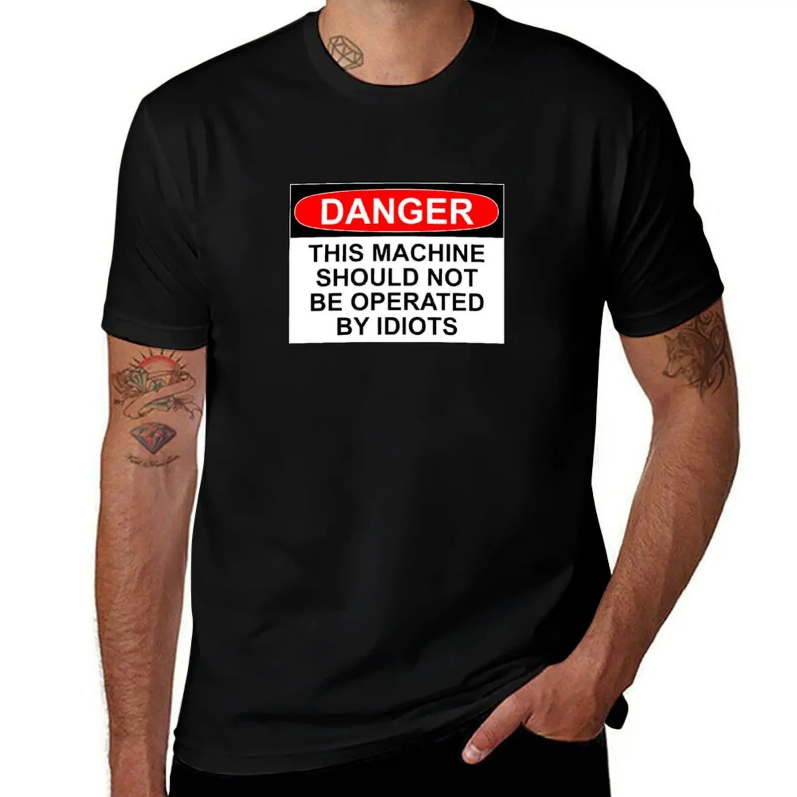 

DANGER: THIS MACHINE SHOULD NOT BE OPERATED BY IDIOTS T-Shirt Festival Short Sleeve T-Shirt