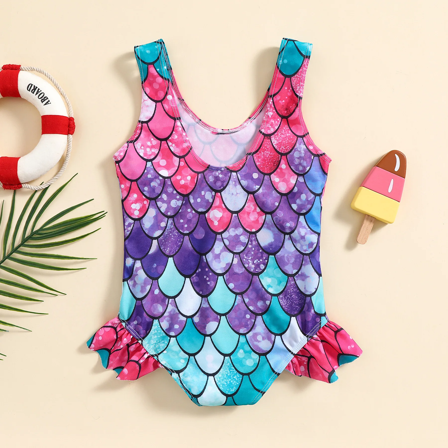 Toddler one piece swimsuit with ruffle and colorful mermaid scale pattern for beach and pool water play