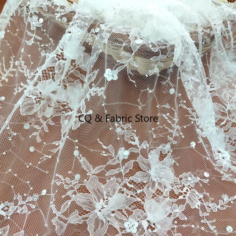 

Off White Net Flowers Mesh Lace Fabric with Sequins for Wedding Dress Designer Fabric French Lace