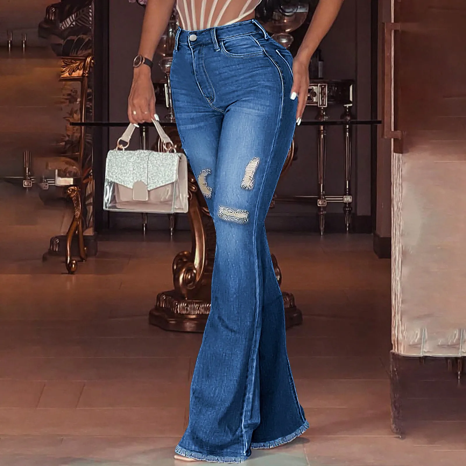 Damskie spodnie jeansowe retro z rozszerzanymi nogawkami, modne, z wysokim stanem, wyszczuplające, seksowne, z dziurami, styl streetwear, do noszenia na co dzień, pasujące do różnych stylizacji.