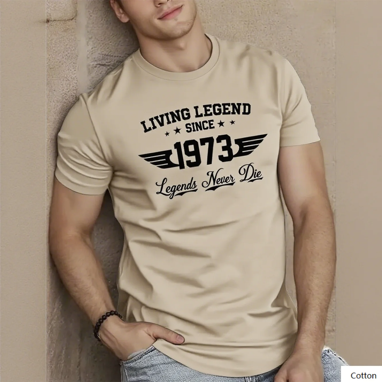 تي شيرت قطني من Living Legend منذ عام 1973 يحتفل على روح خالدة مع هذا المحملة يتميز بنص جريء وتصميم مجنح '1973' #1