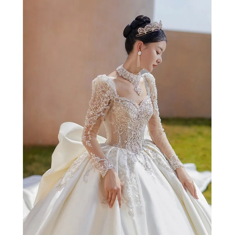 

Long Sleeved Satin Wedding Dress French New Style Retro Palace Style High-end Texture Heavy Craftsmanship Large Tail Customized