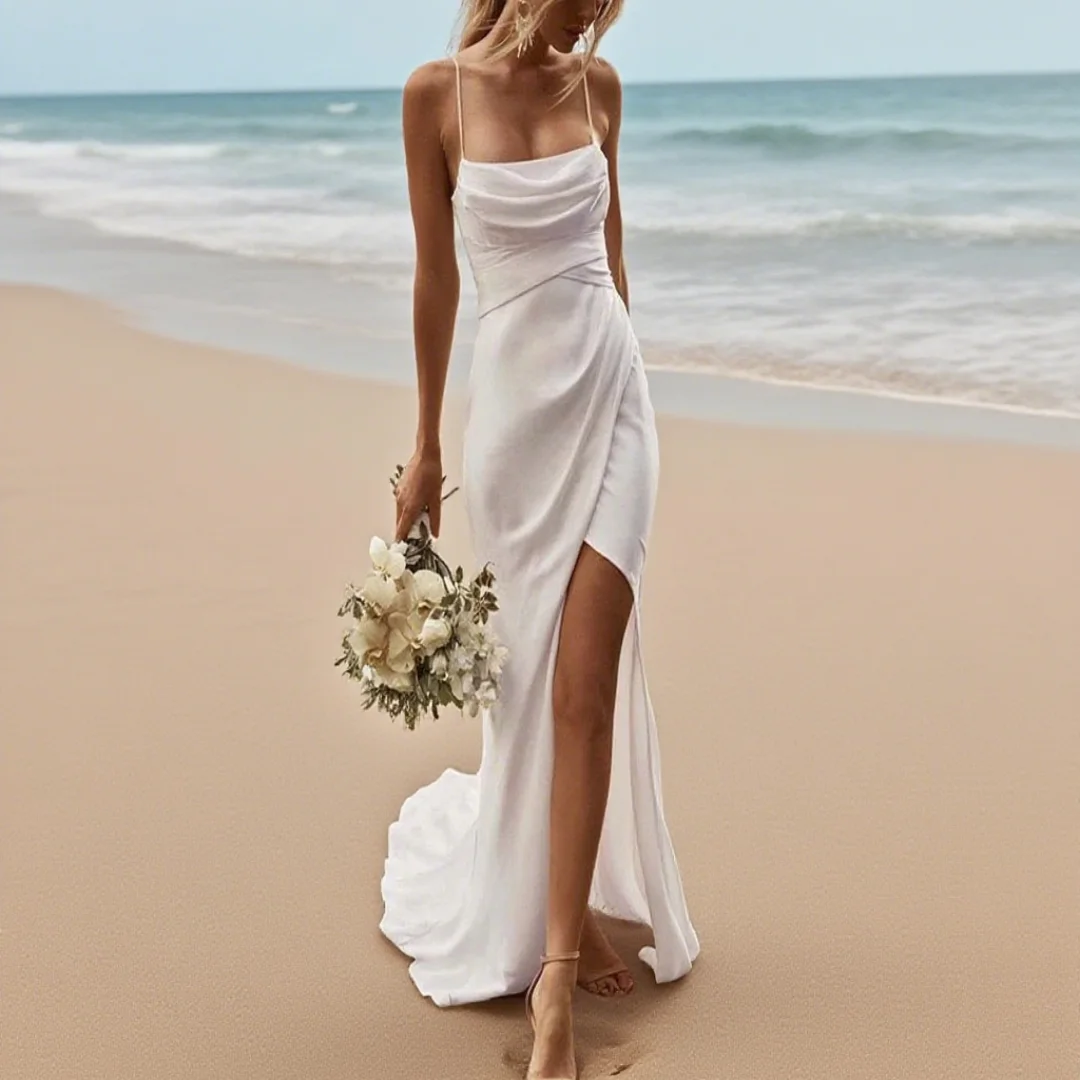 

Customized simple and sexy wedding dress with high slit and shoulder strap design. Formal wedding dress for brides.