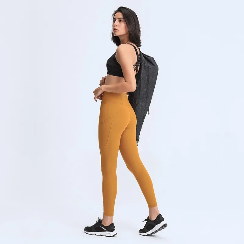 2024 New Yoga Pants, High Quality Women's Sports Bottom Pants with Side Pockets, and Gym Exercise Jogging Crop Pants