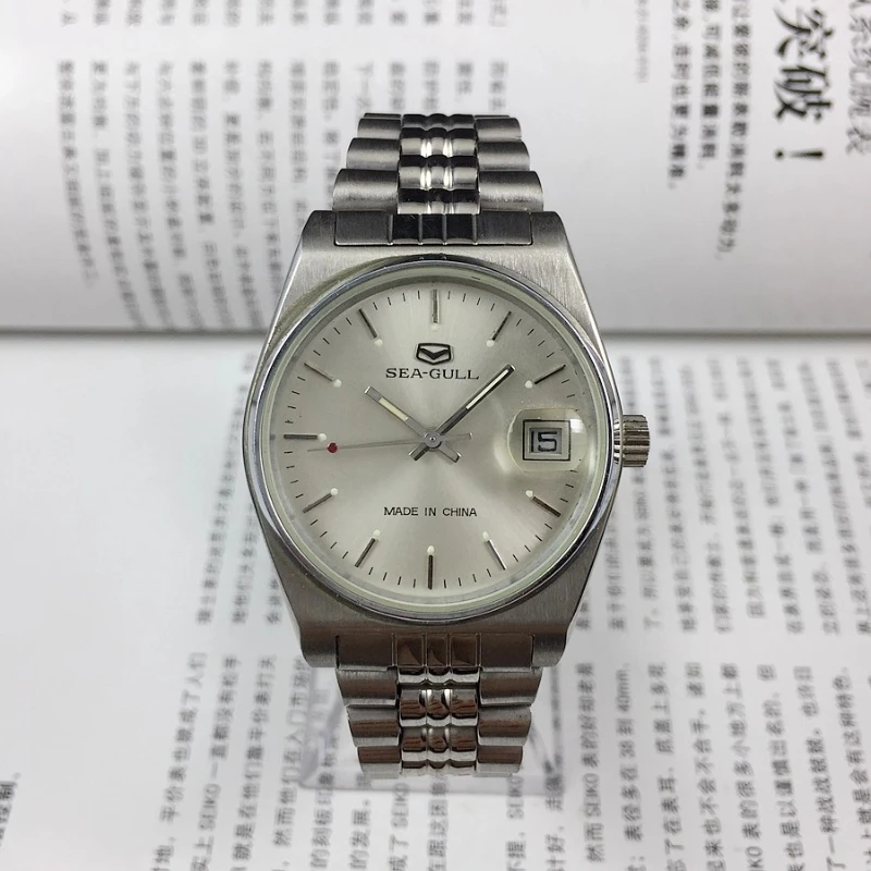 tianjin-watch-factory-seagull-brand-all-steel-silver-surface-single-calendar-manual-mechanical-watch-diameter-36mm