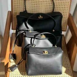 2024 ouro rodeo lock luxo designer sacos de couro grande capacidade portátil axilas saco para deslocamento casual bolsa feminina