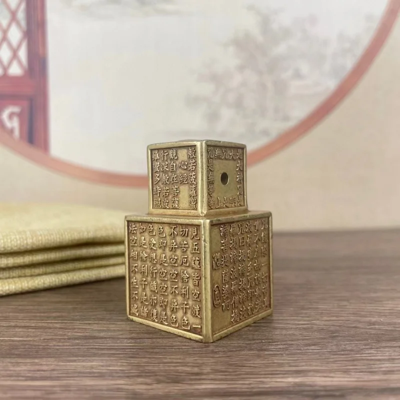 Solid brass six-sided heart sutra seal engraved with the Prajna Paramita Buddha head, finely crafted stationery weight and paper