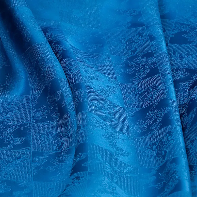 

The elegant and refined cheongsam Hanfu dress made of silk satin with hollowed-out jacquard fabric