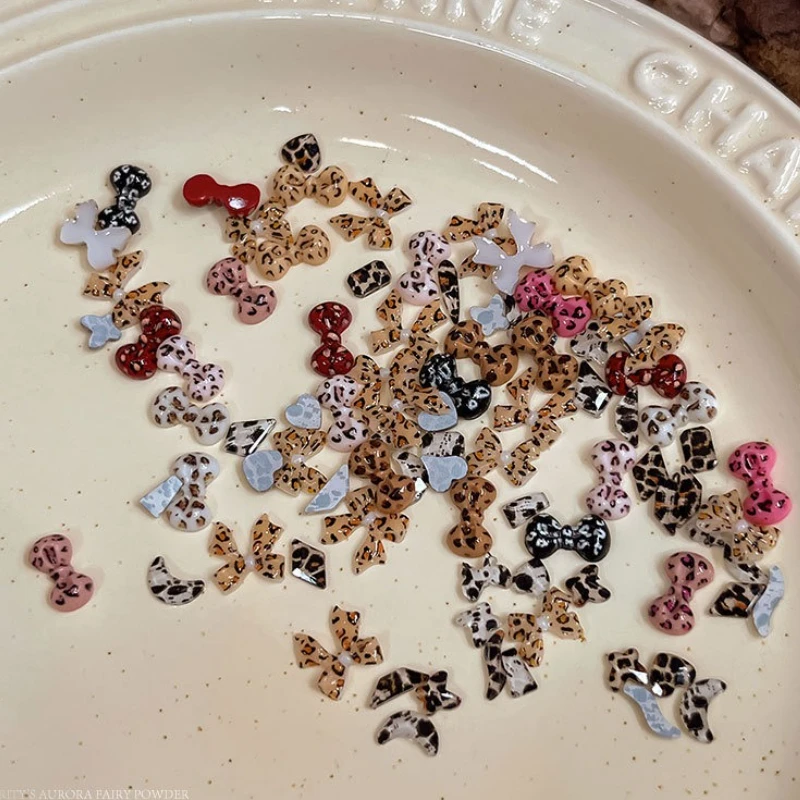 อุปกรณ์ตกแต่งเล็บเรซิ่นลายดาว คริสต์มาส เกล็ดหิมะ ไข่มุก ผีเสื้อ หัวใจ โบว์ลายเสือดาว สำหรับงาน DIY