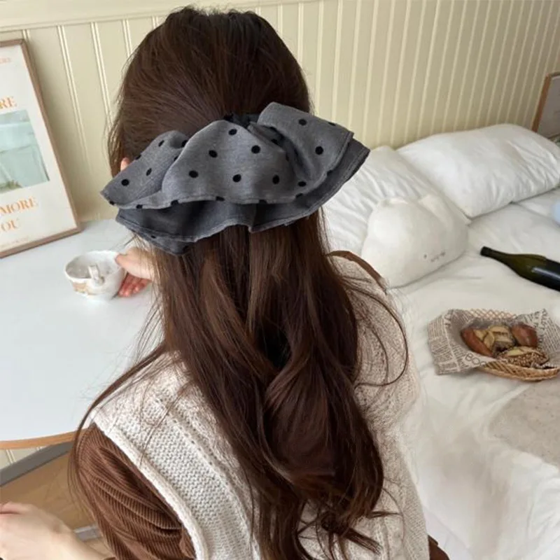 

Клетчатая юбка большего размера с большим бантом для женщин. Стильная веревка для волос с низким хвостом.