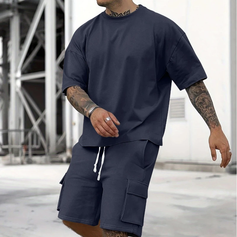 

Мужская одежда 2026 - Новинка лета: модный комплект из футболки с коротким рукавом и рабочих шорт, повседневный спортивный костюм-двойка