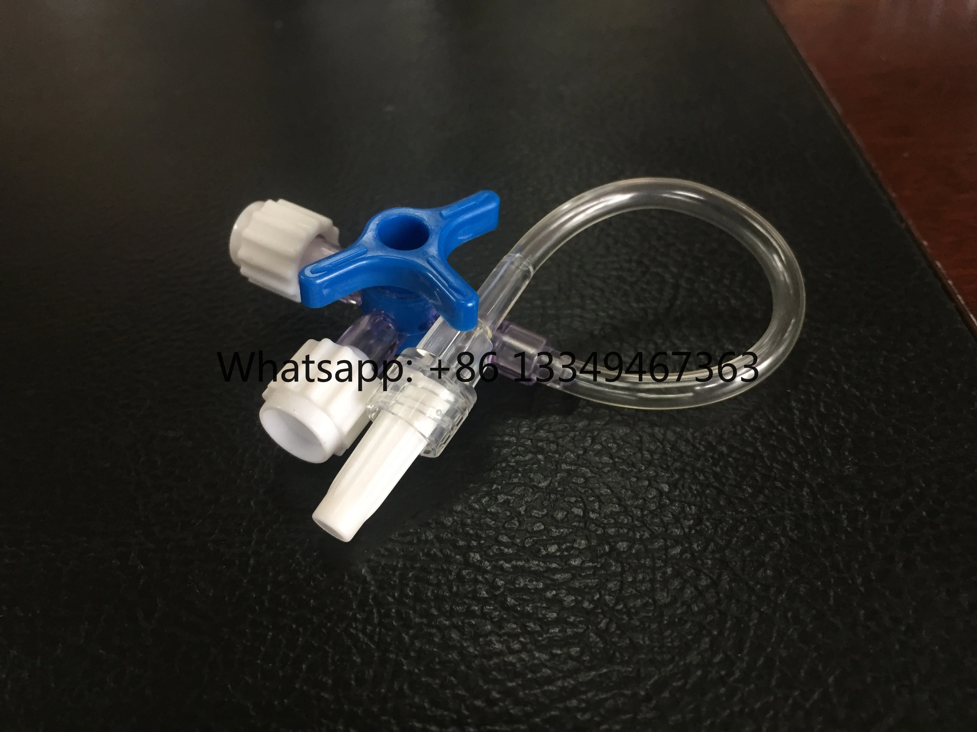 

Disposable three way stopcock with extension tube