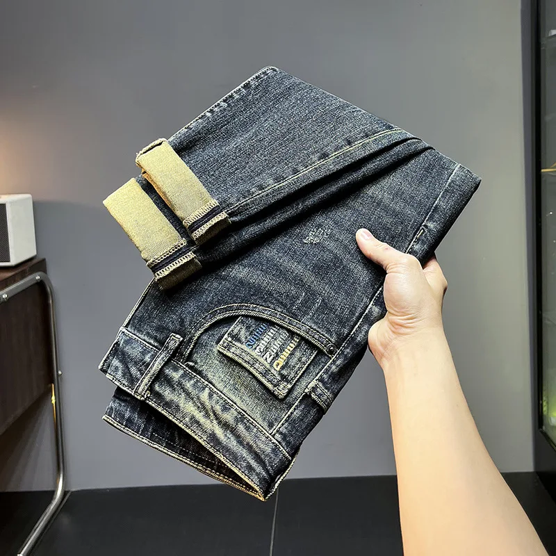 Celana Jeans biru Vintage untuk pria, celana Denim pas badan kasual pudar modis cuci gudang tren musim gugur dan musim dingin baru 2024