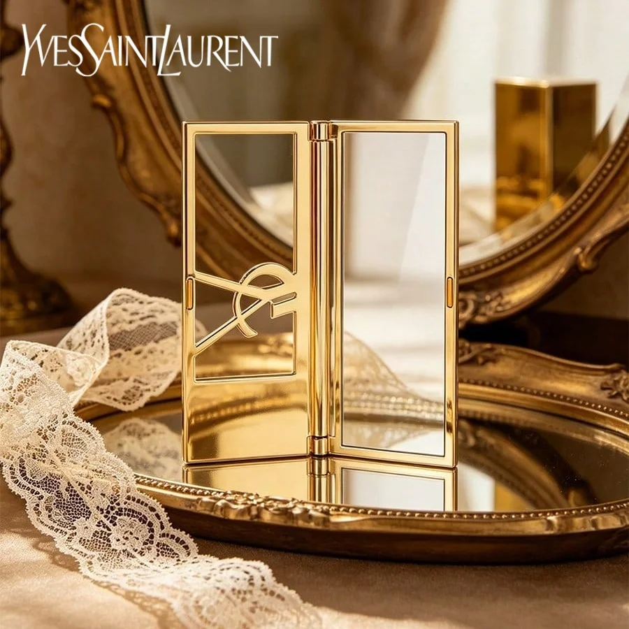 Image of YSL Hochwertiger Goldener Tragbarer Klappbarer Schminkspiegel Leichtgewichtig Einfach zu Transportieren Essentielles Make-up-Accessoire Überlegene Qualität Ideales Urlaubsgeschenk