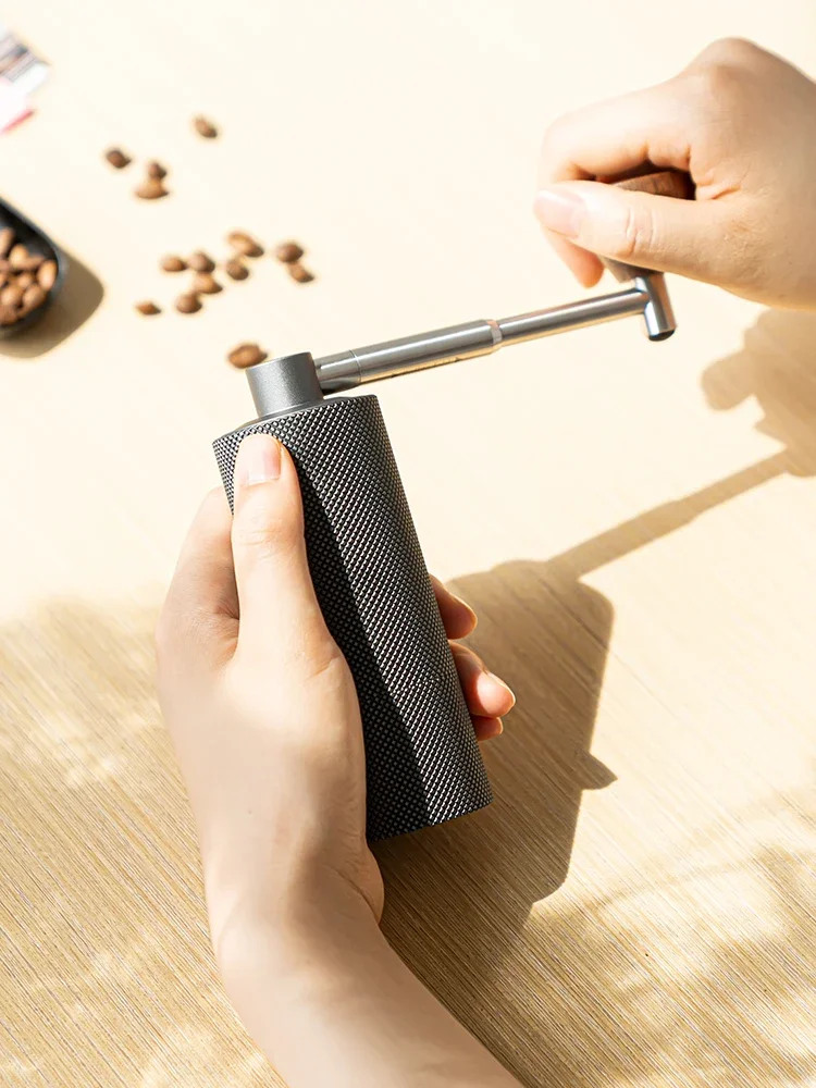 Taimo Chestnut Nano portable folding hand cranked grinder for home coffee beans, with central axis positioning