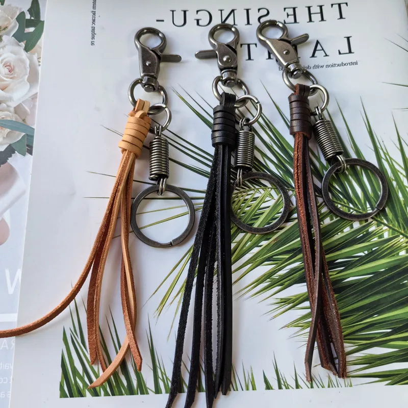 Hot selling Cowhide Weaving Alloy Lobster Buckle Leather Tassel Pendant Keychain Bag Accessories For Women