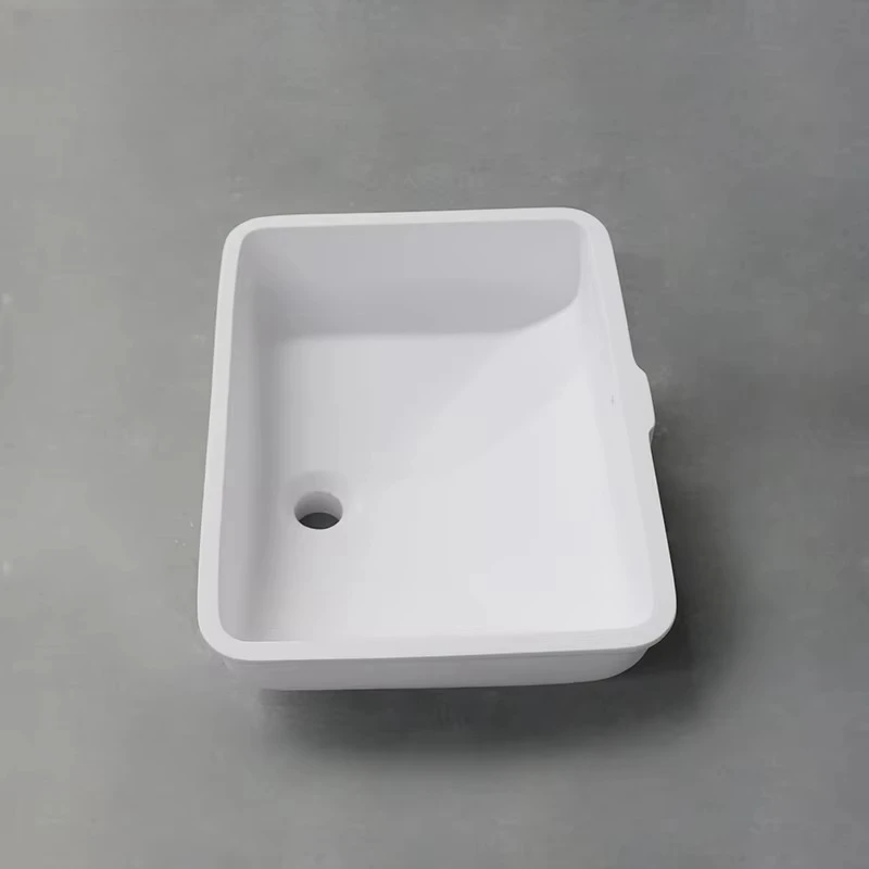 Install sink bathroom wash basin under solid surface stone with overflow hole