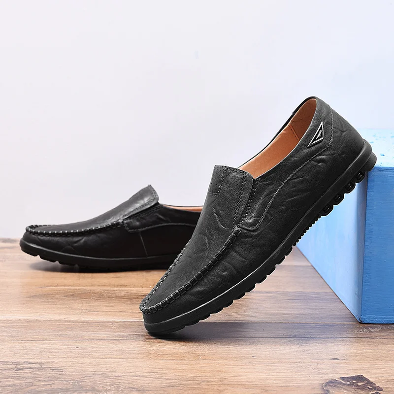 

Новые кожаные мужские повседневные туфли, люксовый бренд, мужские лоферы, мокасины, дышащие, черные, без шнурков, для вождения, большие размеры для мужчин