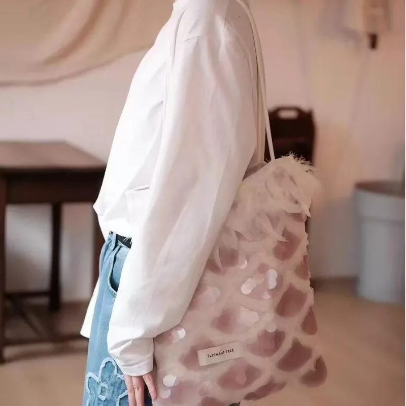 

Sequin Feather Shoulder Bag Travel Canvas Bag Large Capacity Niche Bag Temperament Commuter Korean Office Ins Spring and Summer