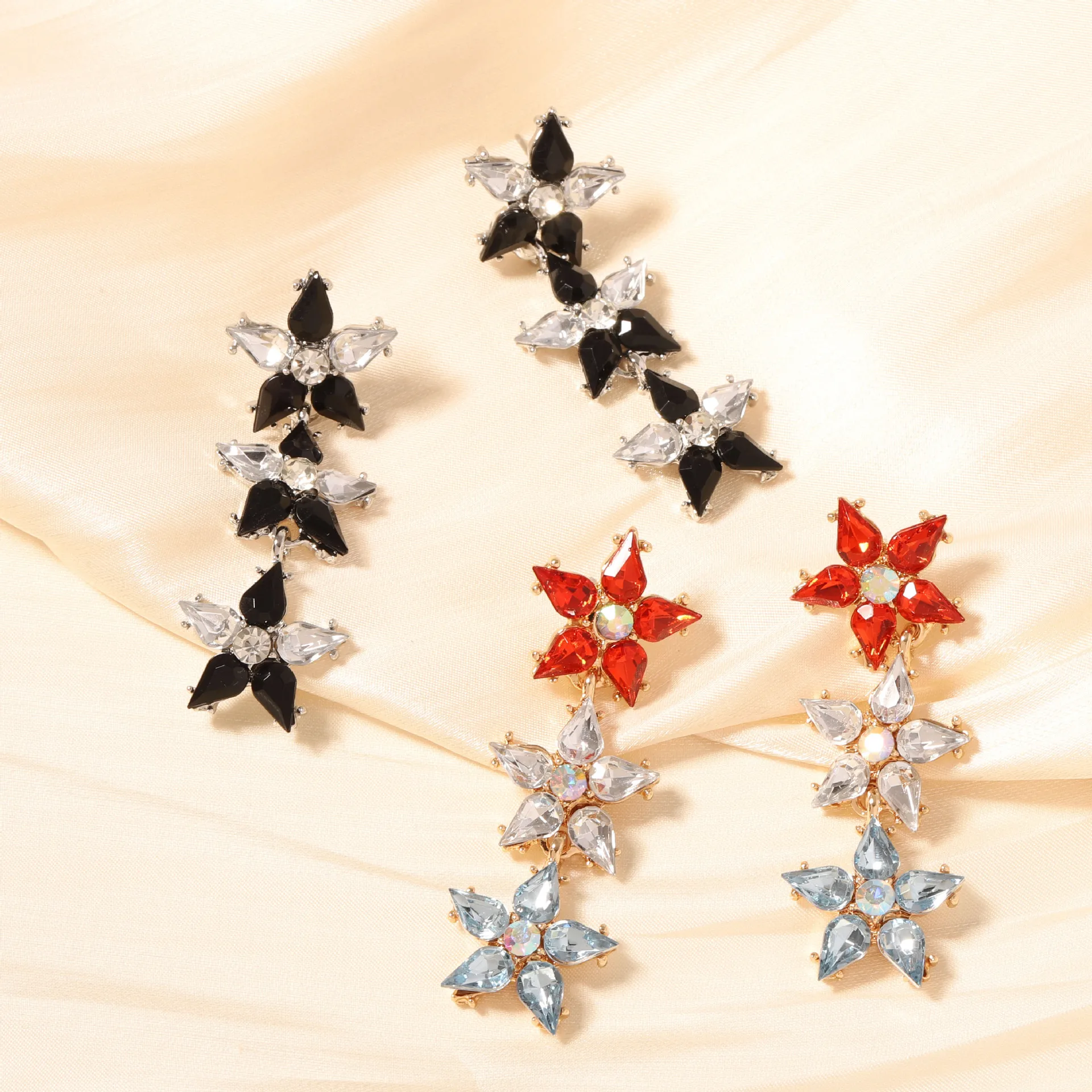 Exquisite and fashionable high-end design with colored diamonds splicing five-pointed star earrings, versatile and casual temper