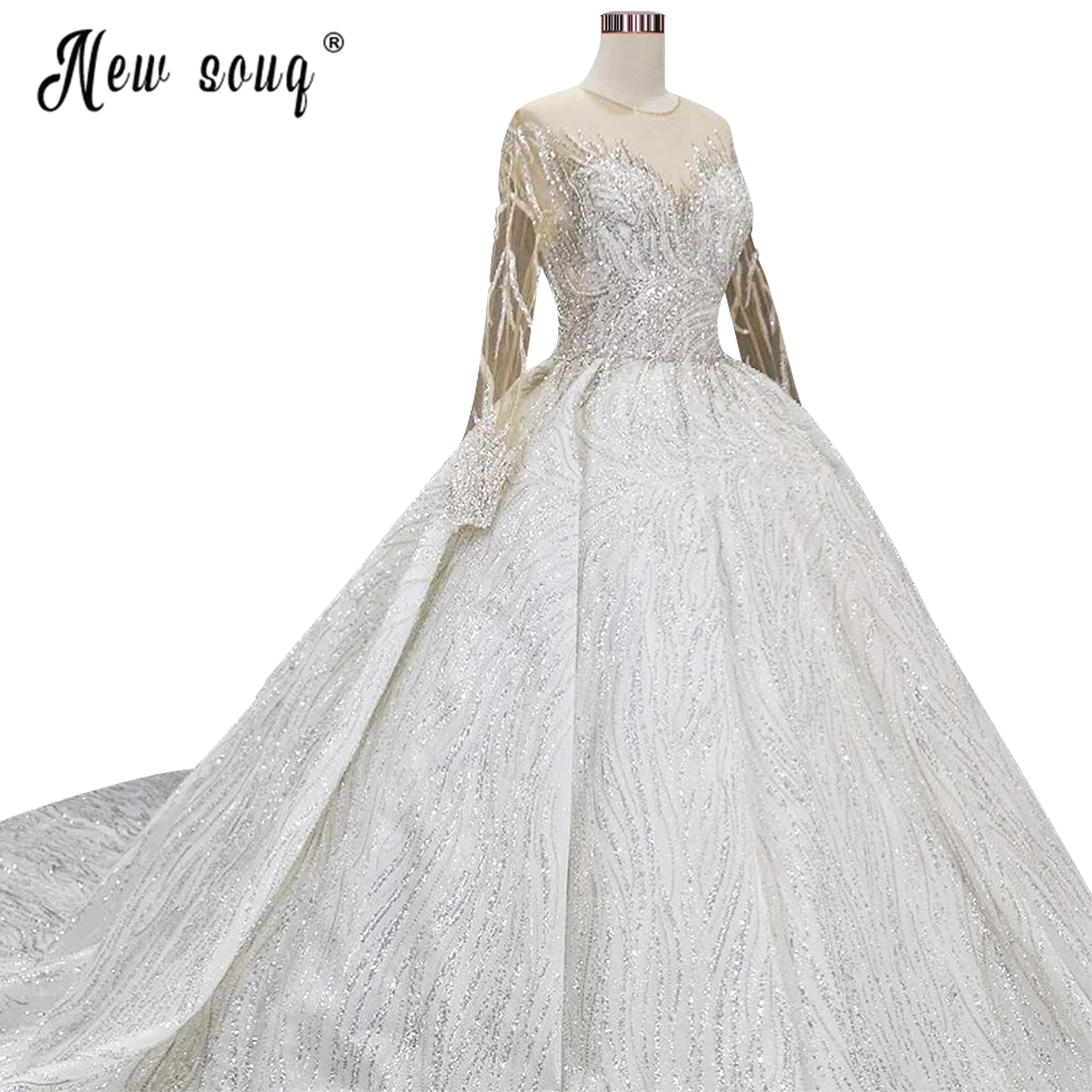 Glitter Sheer Neck Bling Ball Gown abito da sposa Plus Size Custom Dubai manica lunga abiti da sposa con perline pesanti Vestido De Novia